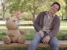 Ted (voiced by writer-director Seth MacFarlane) and Johnny (Mark Wahlberg) share a laugh in Ted. The talking teddy bear got his powers when 8-year-old Johnny wished upon a falling star for Ted to speak. Ted (voiced by writer-director Seth MacFarlane) and Johnny (Mark Wahlberg) share a laugh in Ted. The talking teddy bear got his powers when 8-year-old Johnny wished upon a falling star for Ted to speak.