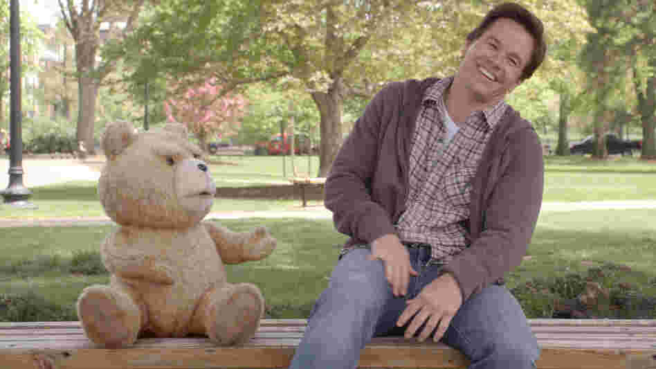 Ted (voiced by writer-director Seth MacFarlane) and Johnny (Mark Wahlberg) share a laugh in Ted. The talking teddy bear got his powers when 8-year-old Johnny wished upon a falling star for Ted to speak. Ted (voiced by writer-director Seth MacFarlane) and Johnny (Mark Wahlberg) share a laugh in Ted. The talking teddy bear got his powers when 8-year-old Johnny wished upon a falling star for Ted to speak.