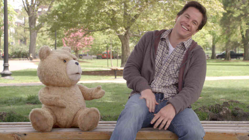 Ted (voiced by writer-director Seth MacFarlane) and Johnny (Mark Wahlberg) share a laugh in Ted. The talking teddy bear got his powers when 8-year-old Johnny wished upon a falling star for Ted to speak. Ted (voiced by writer-director Seth MacFarlane) and Johnny (Mark Wahlberg) share a laugh in Ted. The talking teddy bear got his powers when 8-year-old Johnny wished upon a falling star for Ted to speak.