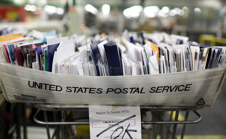 Cartons of mail ready to be sorted sit on a shelf at the U.S. Post Office sort center in San Francisco, California. Cartons of mail ready to be sorted sit on a shelf at the U.S. Post Office sort center in San Francisco, California.