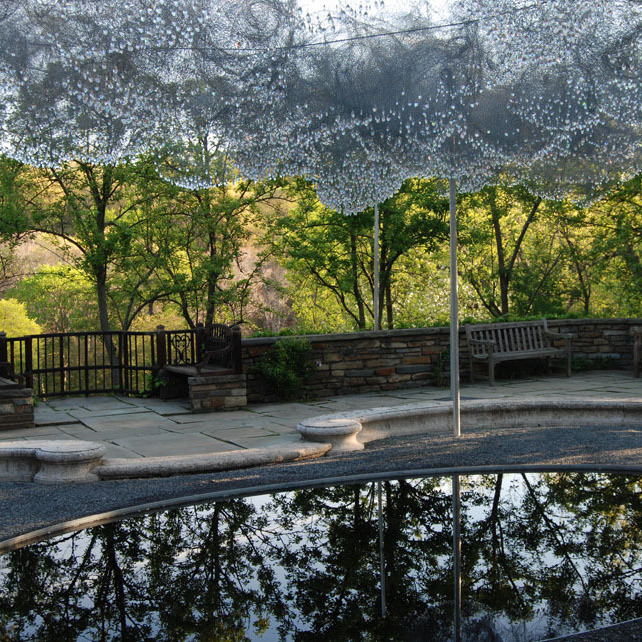 Crystals and carefully folded wire evoke the image of a cloud hanging over a reflecting pool at Dumbarton Oaks.