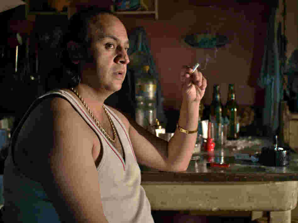 Miroslav Gulyas as Zigo, a crime boss in his Roma village and Adam's uncle turned stepfather.