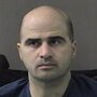 The FBI is investigating more than 100 suspected Muslim extremists who are part of the U.S. military community, officials tell NPR. U.S. authorities have increased scrutiny since the 2009 shooting attack at Fort Hood, Texas, that left 13 dead. Maj. Nidal Hasan, charged with the killings, is shown here in an April 2010 court hearing. The FBI is investigating more than 100 suspected Muslim extremists who are part of the U.S. military community, officials tell NPR. U.S. authorities have increased scrutiny since the 2009 shooting attack at Fort Hood, Texas, that left 13 dead. Maj. Nidal Hasan, charged with the killings, is shown here in an April 2010 court hearing.