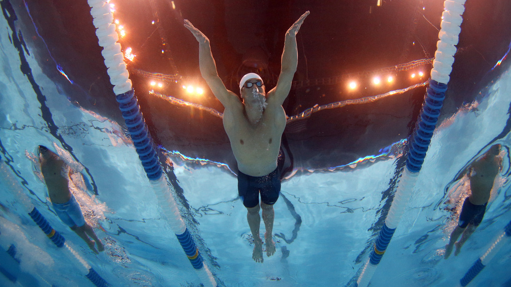 Michael Phelps swims in a preliminary heat at the 2012 U.S. Olympic Trials in Omaha, Nebraska. Phelps and rival Ryan Lochte were awoken from their afternoon naps by a fire alarm at their hotel Monday.
