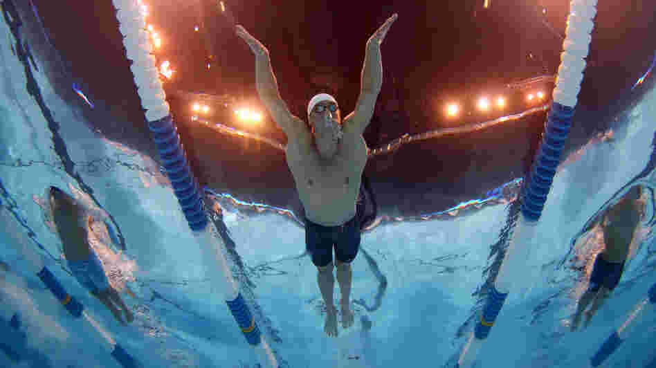 Michael Phelps swims in a preliminary heat at the 2012 U.S. Olympic Trials in Omaha, Nebraska. Phelps and rival Ryan Lochte were awoken from their afternoon naps by a fire alarm at their hotel Monday.