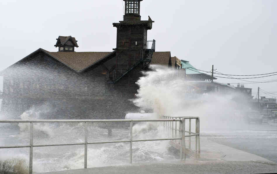 High winds, high tide strike at the main street of Cedar Key, Fla., as Tropical Storm Debby makes its way across the Gulf of Mexico on Sunday.