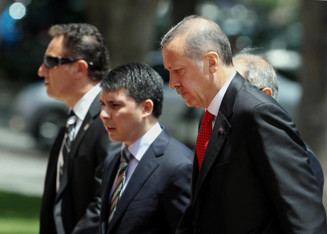 Turkish Prime Minister Recep Tayyip Erdogan, right, arrives for a cabinet meeting in his office in Ankara, Turkey on Monday.