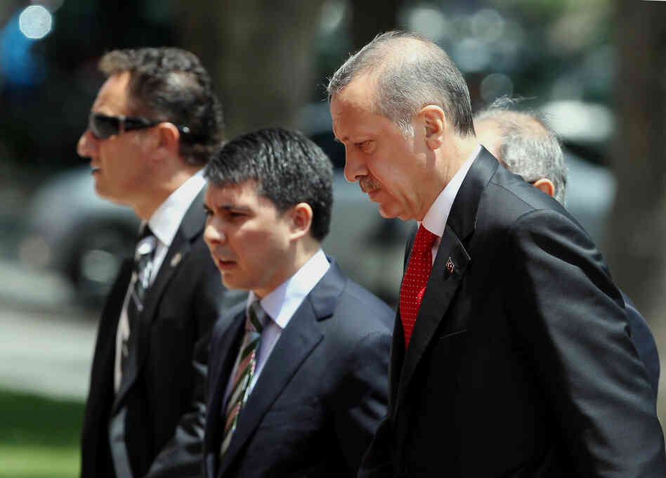 Turkish Prime Minister Recep Tayyip Erdogan, right, arrives for a cabinet meeting in his office in Ankara, Turkey on Monday.