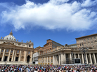 People gather on St. Peter's square to hear Pope Benedict XVI at the Vatican Sunday. The Vatican has hired Fox News correspondent Greg Burke to advise its press office. People gather on St. Peter's square to hear Pope Benedict XVI at the Vatican Sunday. The Vatican has hired Fox News correspondent Greg Burke to advise its press office.