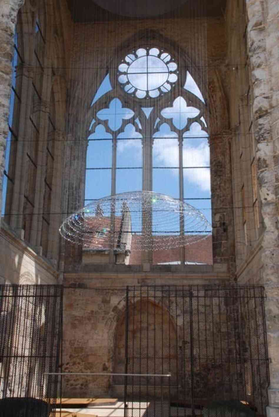 Cao and Perrot's White Dome hangs inside a free-standing tower that used to be part of Beauvais' Saint-Barthelemy Collegiate Church.