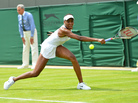 Venus Williams stretches for a return in her first-round defeat to Russia's Elena Vesnina on the first day of the Wimbledon Championships. For Williams, 32, it was her earliest exit from Wimbledon in 15 years. Venus Williams stretches for a return in her first-round defeat to Russia's Elena Vesnina on the first day of the Wimbledon Championships. For Williams, 32, it was her earliest exit from Wimbledon in 15 years.
