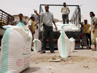 Displaced Yemenis receive food aid from the U.N. High Commissioner for Human Rights in the southern province of Abyan. While food is available in the country, many Yemenis cannot afford to buy it. About 10 million people are going hungry, aid groups say. Displaced Yemenis receive food aid from the U.N. High Commissioner for Human Rights in the southern province of Abyan. While food is available in the country, many Yemenis cannot afford to buy it. About 10 million people are going hungry, aid groups say.