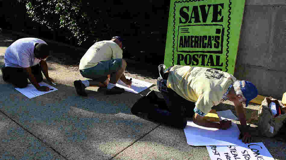 Postal workers and activists make signs for their hunger strike in front of the Rayburn House Office building in Washington, D.C. Postal workers and activists make signs for their hunger strike in front of the Rayburn House Office building in Washington, D.C.