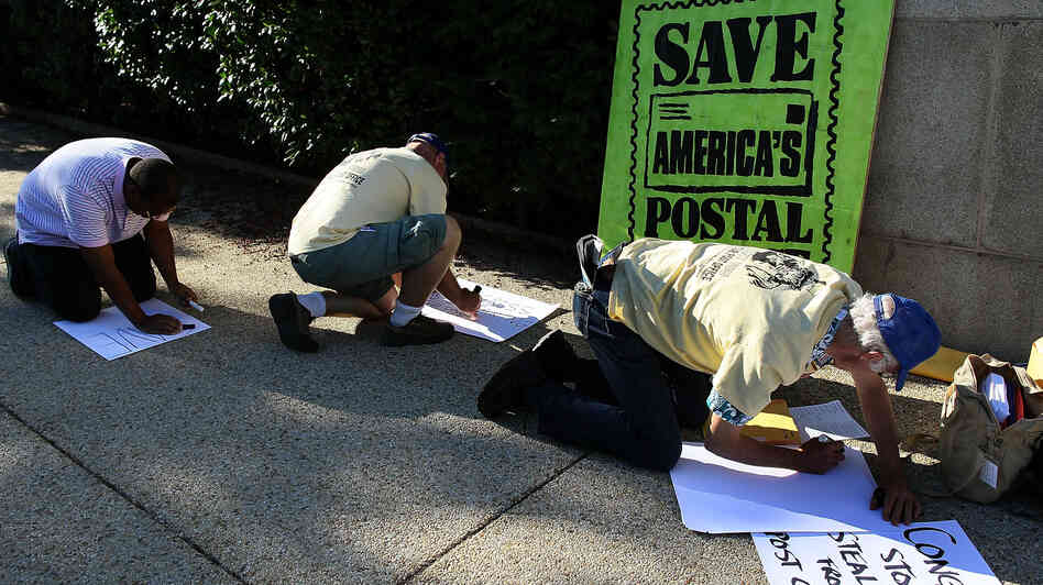 Postal workers and activists make signs for their hunger strike in front of the Rayburn House Office building in Washington, D.C. Postal workers and activists make signs for their hunger strike in front of the Rayburn House Office building in Washington, D.C.