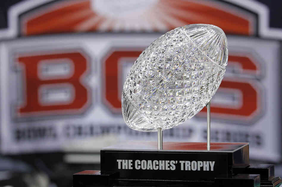 The Coaches' Trophy is displayed before the BCS National Championship game between the LSU and Alabama in New Orleans. College football will finally have a playoff.