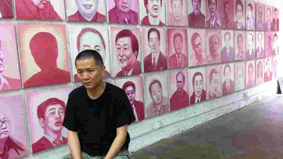 Artist and filmmaker Zhang Bingjian sits in his Beijing studio in front of his Hall of Fame — portraits of corrupt Chinese officials. He has commissioned portraits of 1,600 officials convicted of corruption. Artist and filmmaker Zhang Bingjian sits in his Beijing studio in front of his Hall of Fame — portraits of corrupt Chinese officials. He has commissioned portraits of 1,600 officials convicted of corruption.