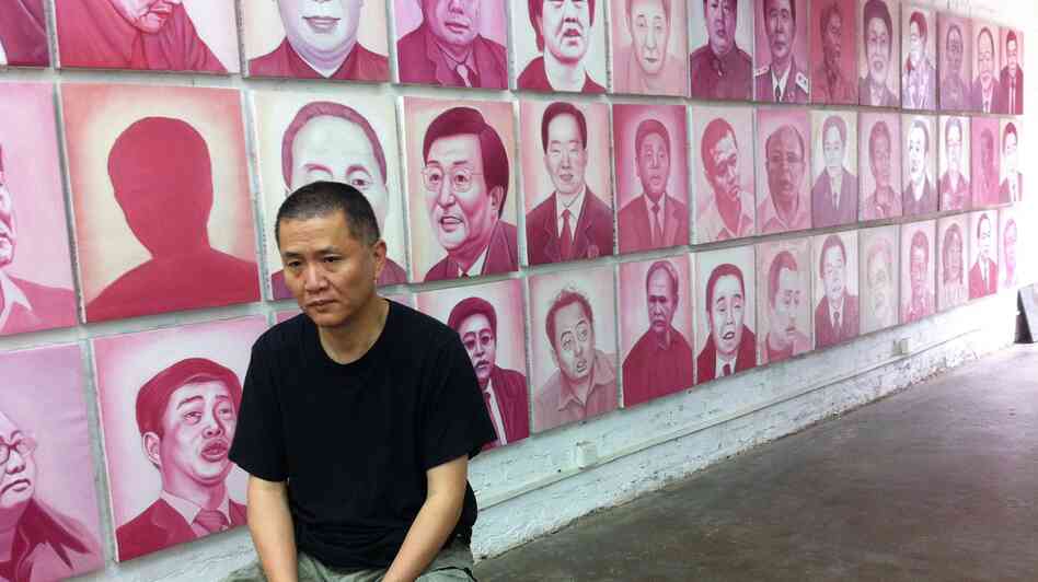 Artist and filmmaker Zhang Bingjian sits in his Beijing studio in front of his Hall of Fame — portraits of corrupt Chinese officials. He has commissioned portraits of 1,600 officials convicted of corruption. Artist and filmmaker Zhang Bingjian sits in his Beijing studio in front of his Hall of Fame — portraits of corrupt Chinese officials. He has commissioned portraits of 1,600 officials convicted of corruption.