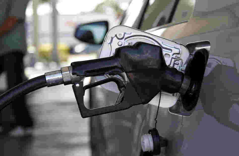 Fuel is pumped into a vehicle Thursday in Miami.