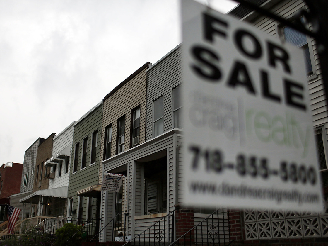 This "For Sale" sign was hanging outside a home in Brooklyn, N.Y., earlier this month.