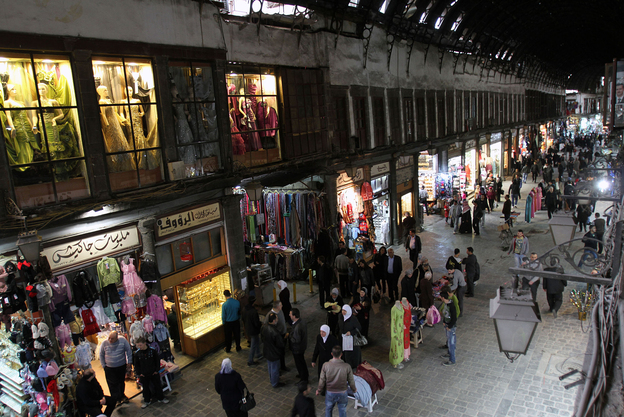 People walk through Hamidiyah market in Damascus, Syria, Feb. 28. The merchants of this landmark bazaar were once ardent supporters of President Bashar Assad. That's no longer the case.