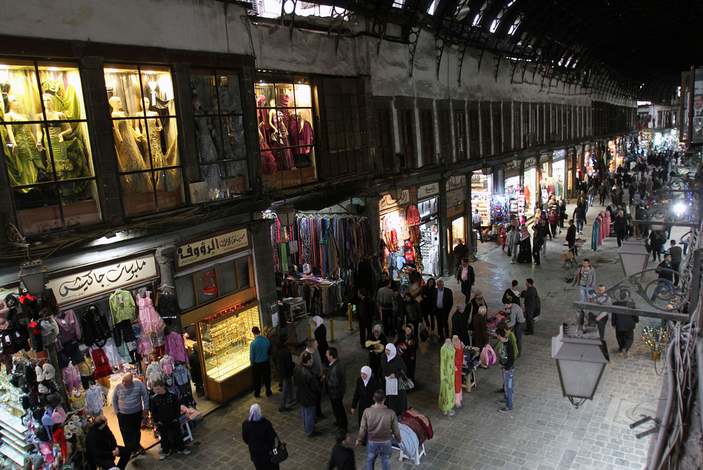 People walk through Hamidiyah market in Damascus, Syria, Feb. 28. The merchants of this landmark bazaar were once ardent supporters of President Bashar Assad. That's no longer the case.