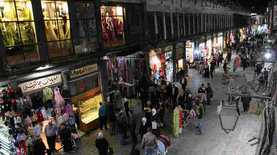 People walk through Hamidiyah market in Damascus, Syria, Feb. 28. The merchants of this landmark bazaar were once ardent supporters of President Bashar Assad. That's no longer the case.