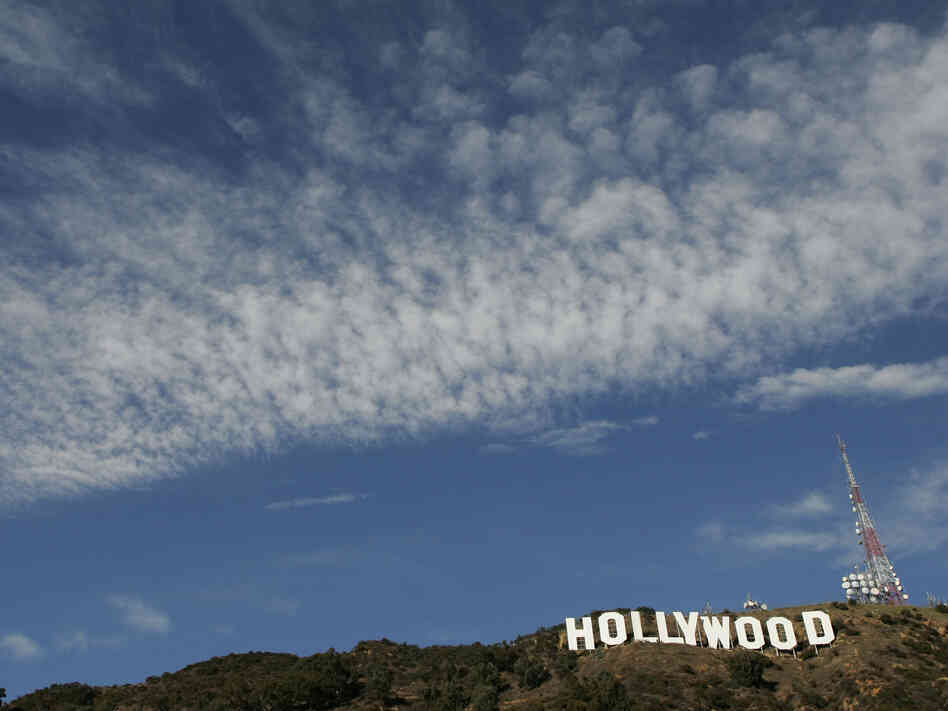 HOLLYWOOD, CA - DECEMBER 5: The newly refurbished Hollywood Sign is seen atop of Mt. Lee HOLLYWOOD, CA - DECEMBER 5: The newly refurbished Hollywood Sign is seen atop of Mt. Lee