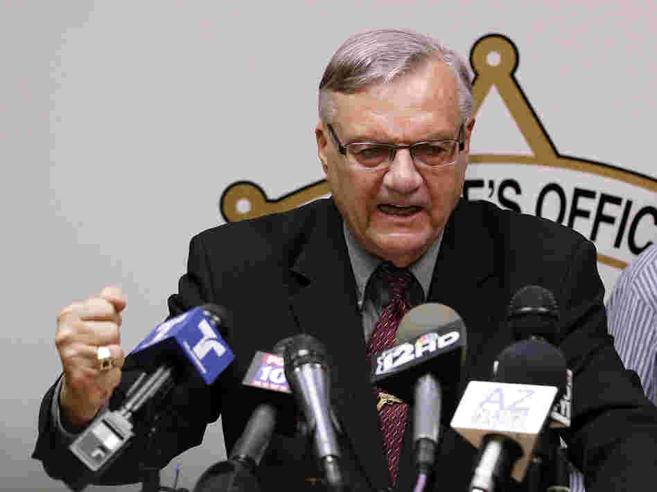 A defiant Maricopa County Sheriff Joe Arpaio answers questions about the Justice Department's lawsuit against him during a news conference in Phoenix last month.