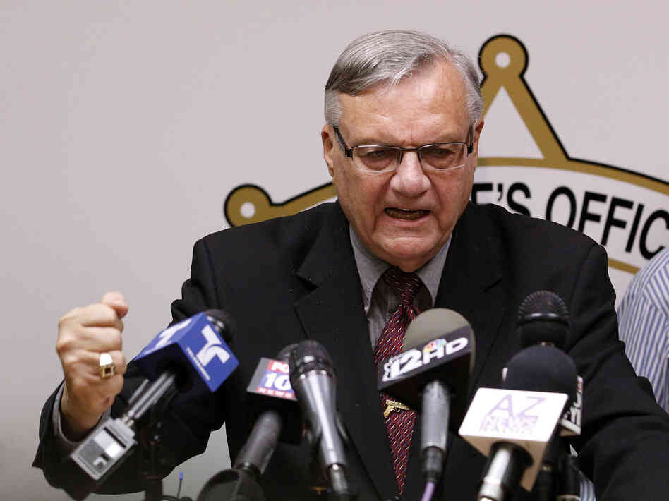 A defiant Maricopa County Sheriff Joe Arpaio answers questions about the Justice Department's lawsuit against him during a news conference in Phoenix last month.
