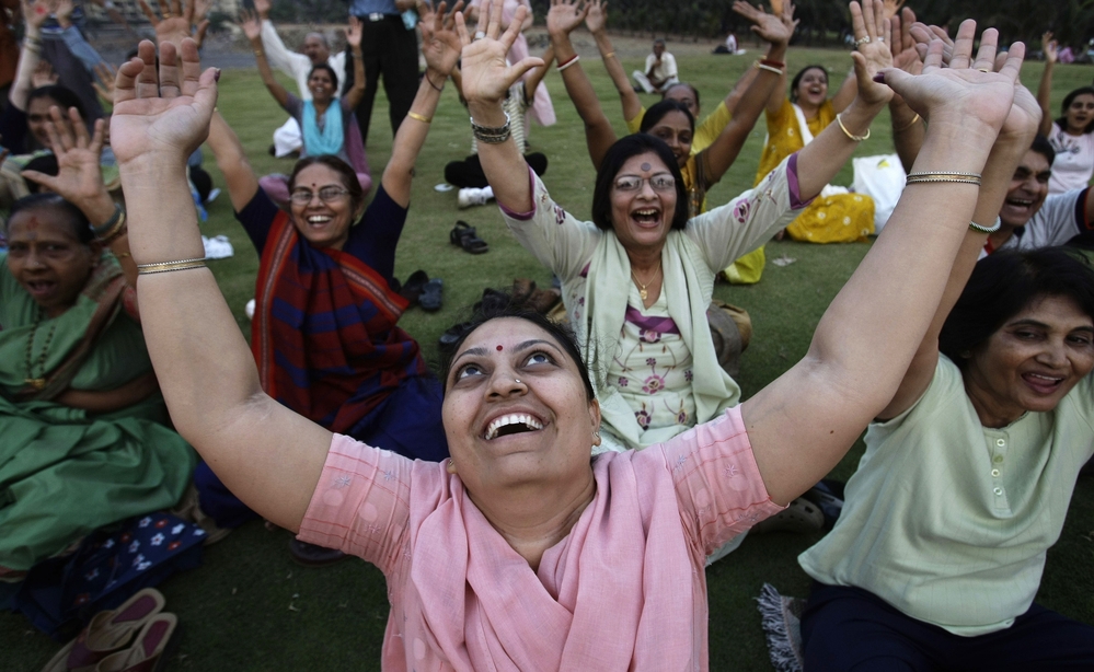 People participate in a Laughter Yoga session in Mumbai, India.