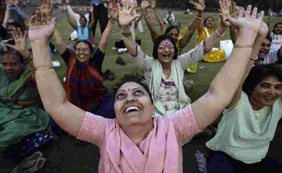 People participate in a Laughter Yoga session in Mumbai, India.