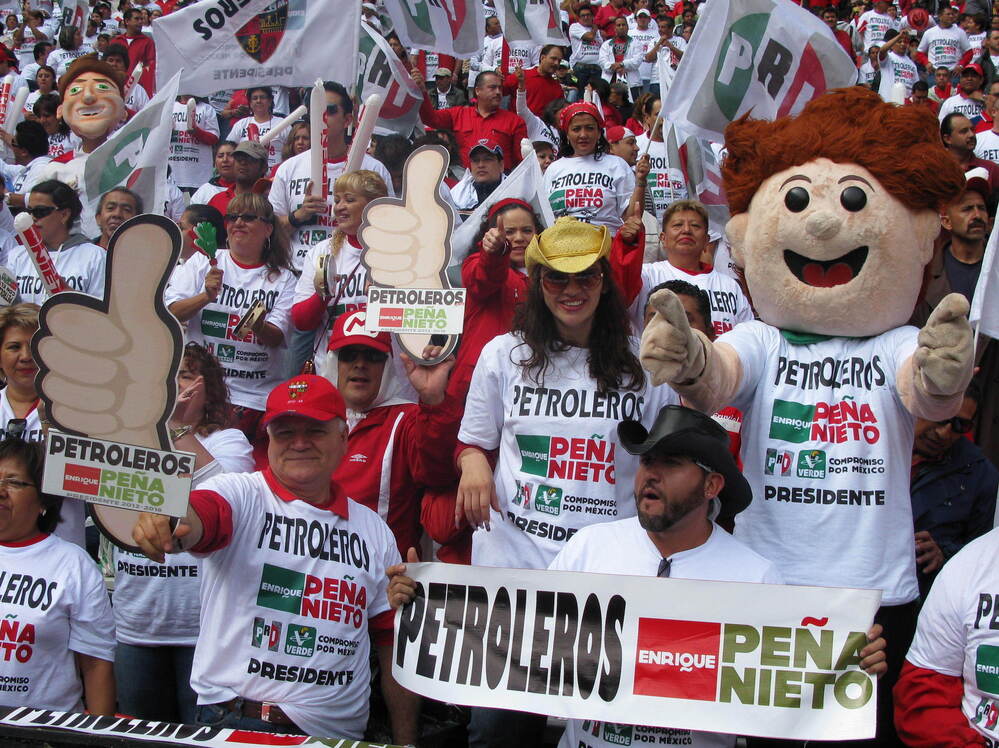 An estimated 100,000 people turned out for Pena Nieto's rally Sunday at Azteca Stadium in Mexico City.