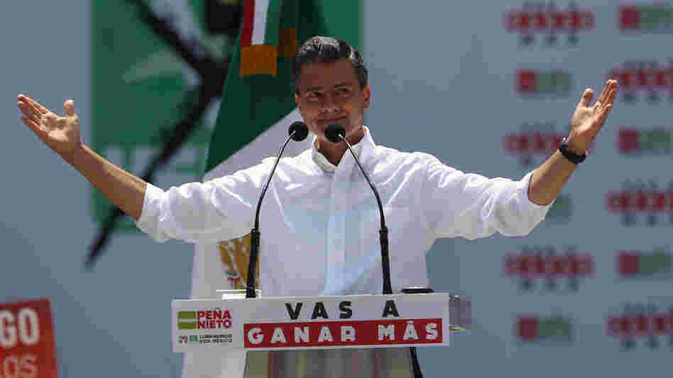 PRI candidate Enrique Pena Nieto campaigns in Mexico City. Pena Nieto is heavily favored in Mexico's presidential election on Sunday. He says his party, which has been out of power for 12 years after ruling for seven decades, has changed its ways.