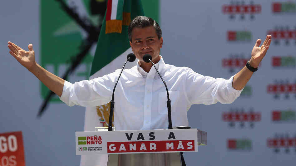 PRI candidate Enrique Pena Nieto campaigns in Mexico City. Pena Nieto is heavily favored in Mexico's presidential election on Sunday. He says his party, which has been out of power for 12 years after ruling for seven decades, has changed its ways.
