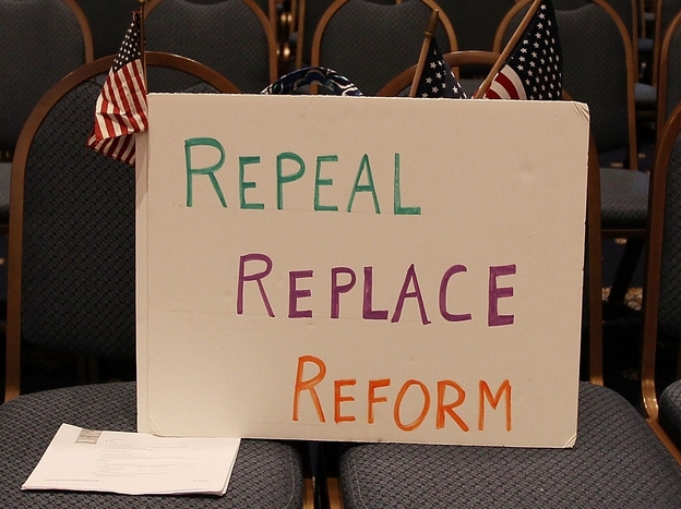 A sign reading 'Repeal Replace Reform' sits on a chair during a news conference at the National Press Club on April 15, 2010 in Washington, D.C. The Obama administration has struggled to sell his health care reform to the public since its passage.