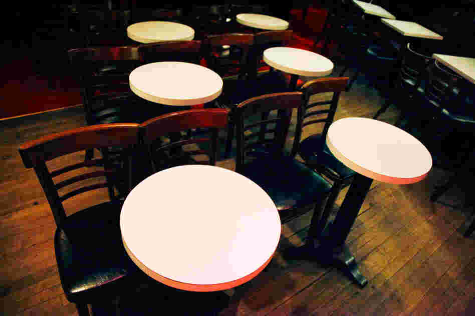 In the interest of accommodating lots of people, tables and chairs should take up as little real estate as humanly possible.