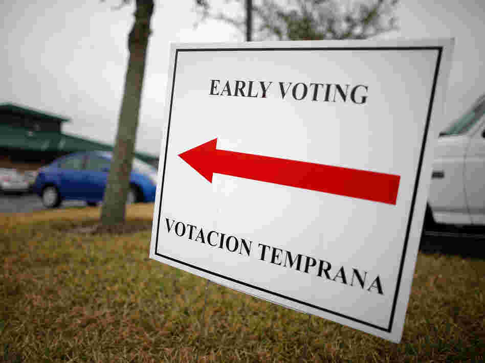 A sign lets voters know they can cast early ballots for the Florida primary election in January at the South Creek Branch Library in Orlando.