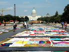 People view the AIDS Memorial Quilt at the National Mall this week. People view the AIDS Memorial Quilt at the National Mall this week.