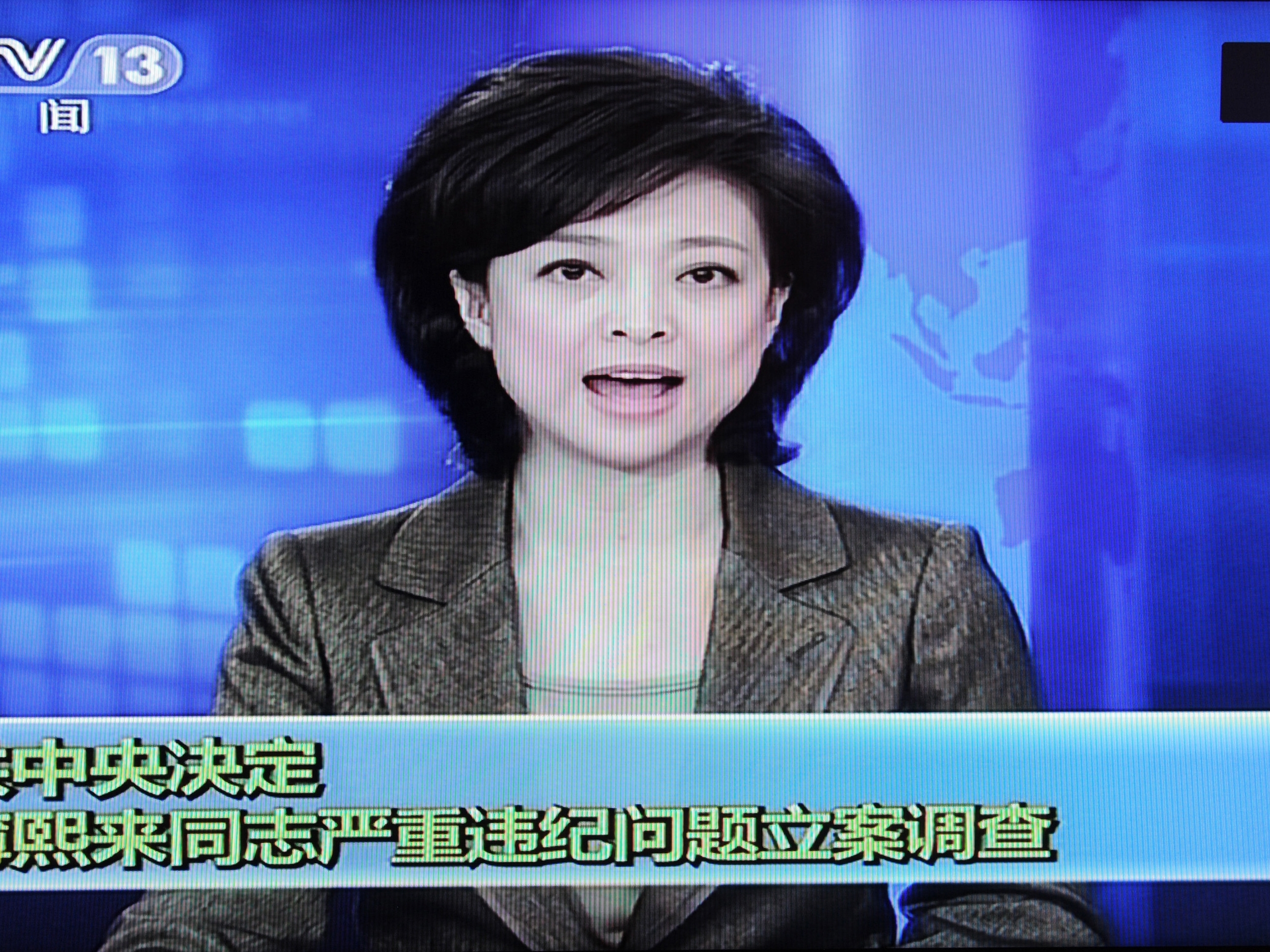 This framegrab taken from China Central Television (CCTV) on April 10 shows a newsreader announcing the suspension of Chinese politician Bo Xilai from the Communist Party's powerful Politburo. Once a rising star, Xilai has been stripped of his post as his wife is investigated for the murder of Neil Heywood, a British national, state media said.