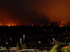 Flames from the Waldo Canyon Fire glowed on the western side of Colorado Springs, Colo., Tuesday night. Flames from the Waldo Canyon Fire glowed on the western side of Colorado Springs, Colo., Tuesday night.