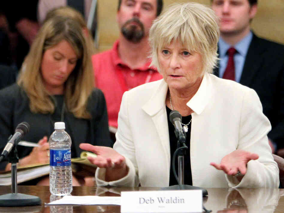 Deb Waldin testifies about her experience with a debt collector at a Minnesota hospital during a hearing led by Sen. Al Franken in St. Paul, Minn., in late May. Deb Waldin testifies about her experience with a debt collector at a Minnesota hospital during a hearing led by Sen. Al Franken in St. Paul, Minn., in late May.