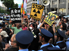 Anti-nuclear activists in front of the prime minister's official residence in Tokyo, June 22. Some 20,000 demonstrators protested against the Japanese government's decision to restart two idle nuclear reactors in western Japan, ending a brief period without any nuclear power generation. Anti-nuclear activists in front of the prime minister's official residence in Tokyo, June 22. Some 20,000 demonstrators protested against the Japanese government's decision to restart two idle nuclear reactors in western Japan, ending a brief period without any nuclear power generation.