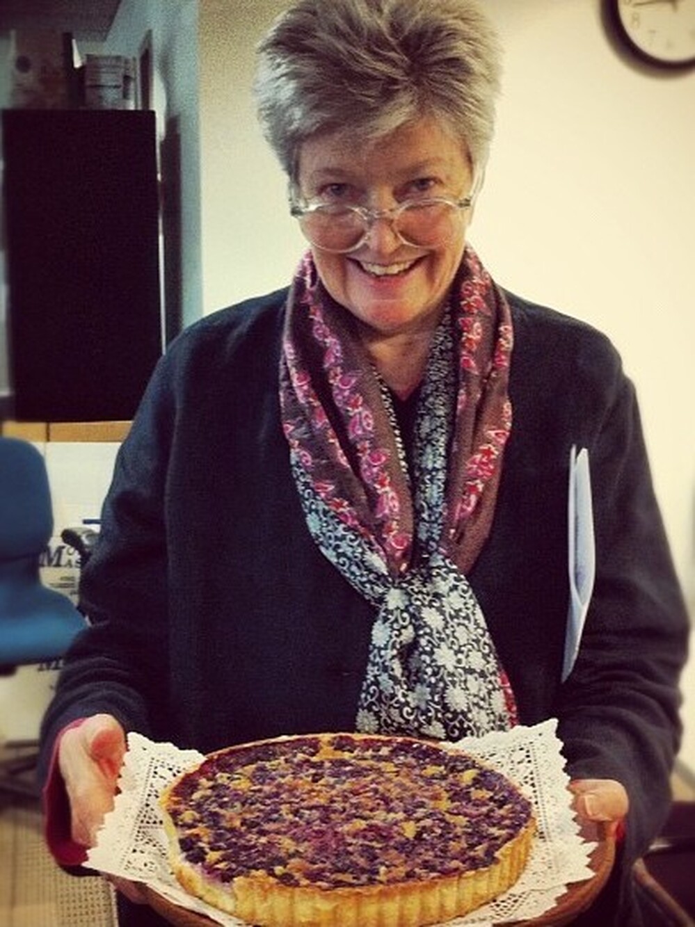 Linda Wertheimer shows off her chess pie with blueberries at the NPR headquarters pie contest.
