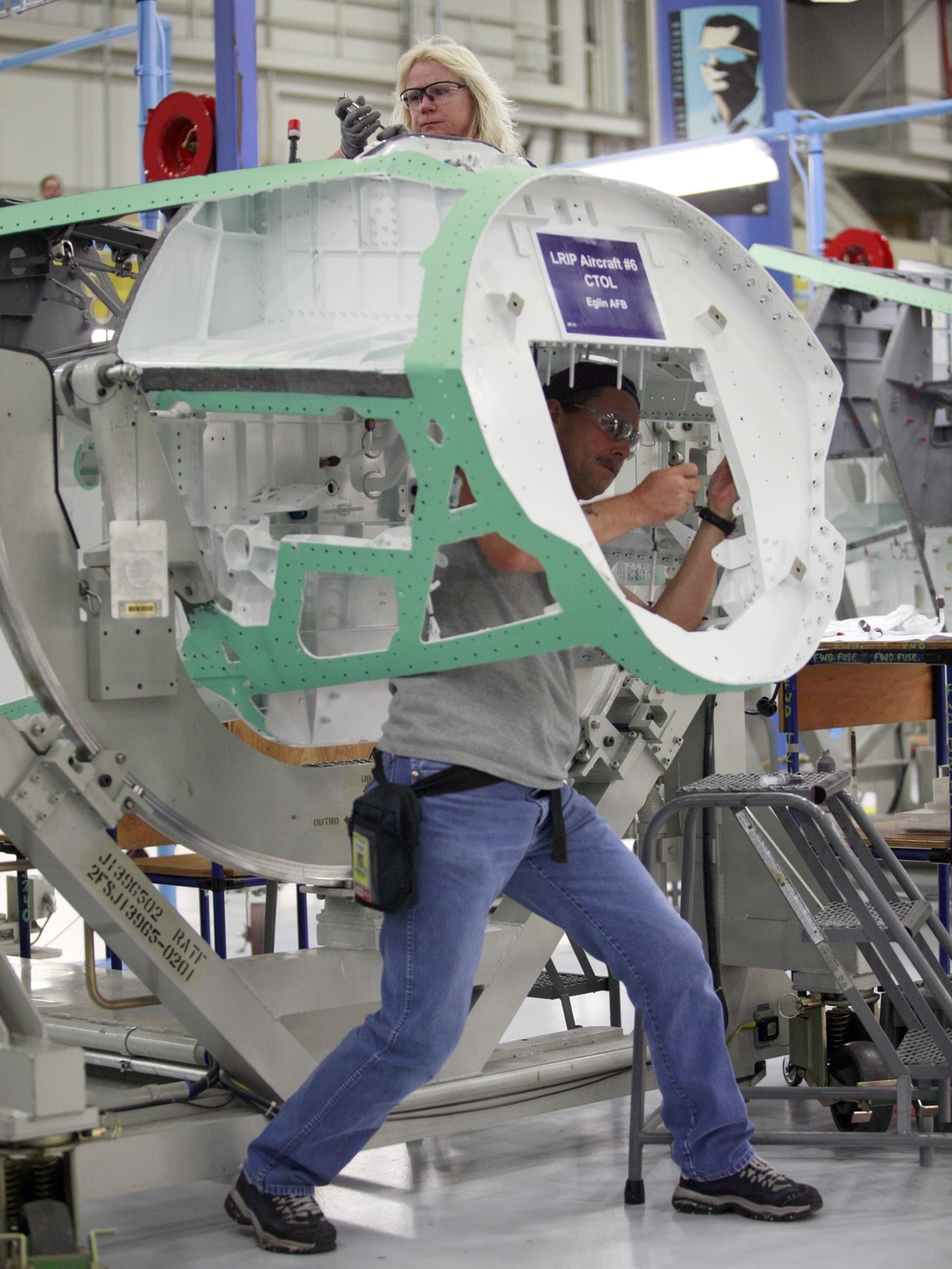 Defense contractor Lockheed Martin says it will be forced to send notices of possible layoffs to its entire workforce if proposed federal budget cuts go into effect.