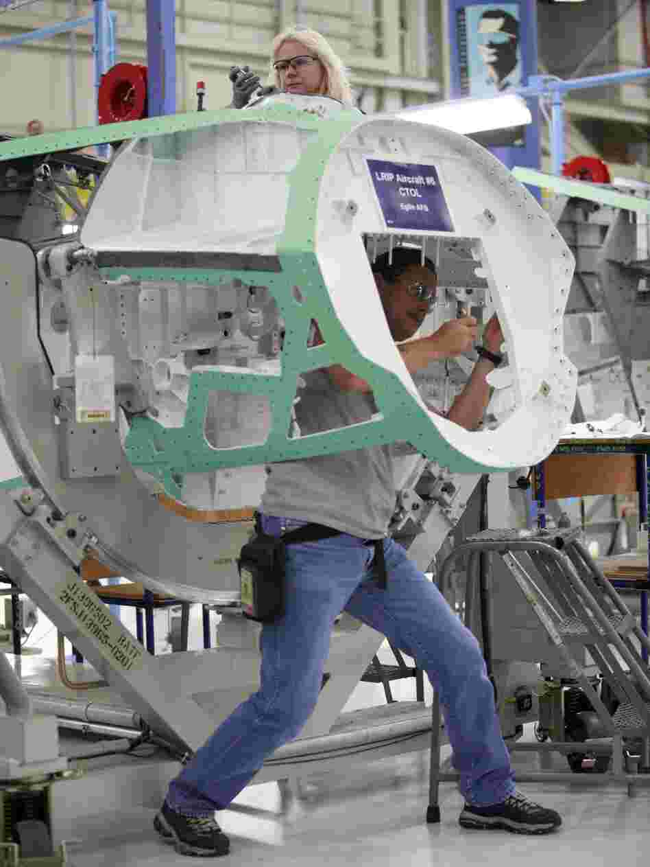 Defense contractor Lockheed Martin says it will be forced to send notices of possible layoffs to its entire workforce if proposed federal budget cuts go into effect.