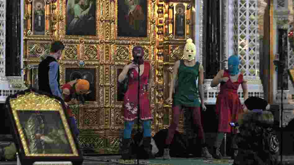 Women in a Russian punk rock group briefly perform a protest song at Moscow's main cathedral, Christ the Savior, in February. The singers criticized the church and Vladimir Putin, who is now president. Three women have been arrested and jailed for months, and the church is demanding harsh punishment. Women in a Russian punk rock group briefly perform a protest song at Moscow's main cathedral, Christ the Savior, in February. The singers criticized the church and Vladimir Putin, who is now president. Three women have been arrested and jailed for months, and the church is demanding harsh punishment.