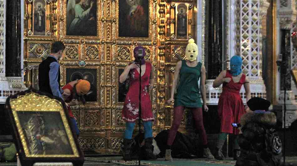 Women in a Russian punk rock group briefly perform a protest song at Moscow's main cathedral, Christ the Savior, in February. The singers criticized the church and Vladimir Putin, who is now president. Three women have been arrested and jailed for months, and the church is demanding harsh punishment. Women in a Russian punk rock group briefly perform a protest song at Moscow's main cathedral, Christ the Savior, in February. The singers criticized the church and Vladimir Putin, who is now president. Three women have been arrested and jailed for months, and the church is demanding harsh punishment.