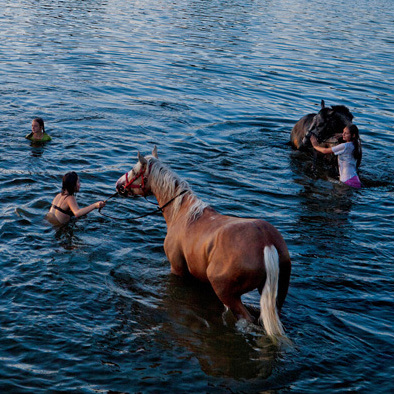 Summer, the short, sweet release from the interminable cocoon of Russian winter, is a time for swimming and riding, and sometimes both.