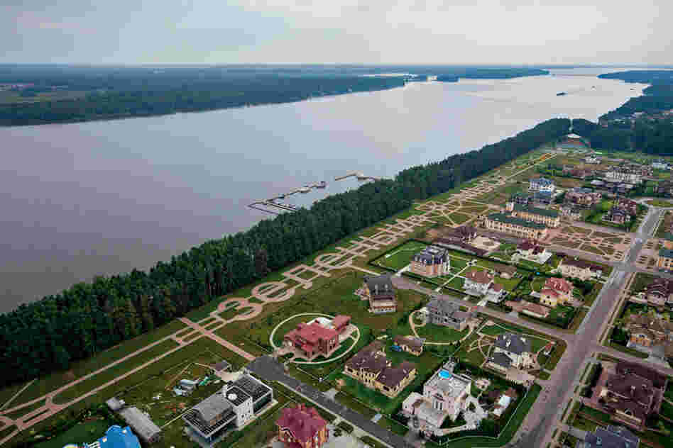 At the lavish end of the dacha spectrum are faux chateaux like these. Roughly half are permanent residences. A helicopter landing pad and yacht club are among the amenities for well-heeled owners.
