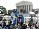 Reporters await a decision by the Supreme Court on the constitutionality of the Affordable Healthcare Act, President Barack Obama's signature healthcare legislation. Reporters await a decision by the Supreme Court on the constitutionality of the Affordable Healthcare Act, President Barack Obama's signature healthcare legislation.